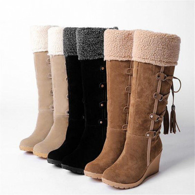 Modern women`s boots with high platform and laces