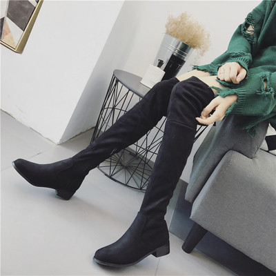 Дълги дамски ботуши с равна подметка и връзки