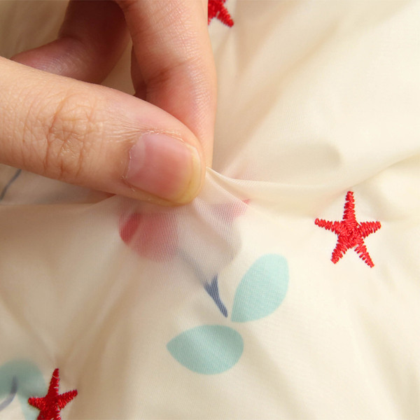 Nööpide ja mustriga laste jope tüdrukutele