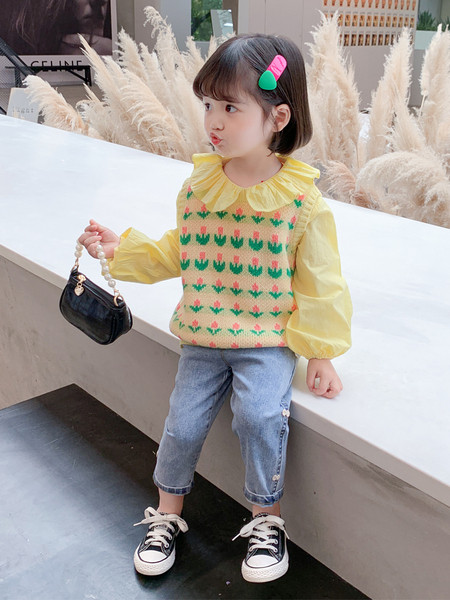 Ovaalse kaelusega kootud lastevest tüdrukutele