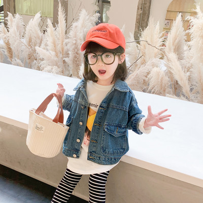 Moodne teksasest laste jope sinise värvi taskutega