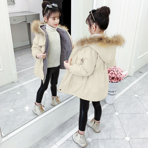 Παιδικό μπουφάν για κορίτσια με γούνα στην κουκούλα και κορδόνια στη μέση