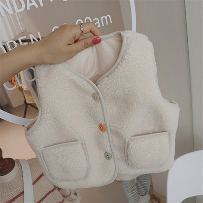 Lühike värviliste nööpide ja taskutega lastevest tüdrukutele