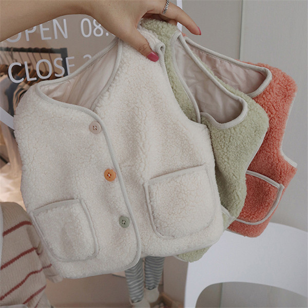 Lühike värviliste nööpide ja taskutega lastevest tüdrukutele