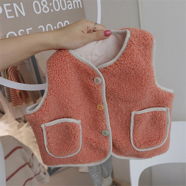 Lühike värviliste nööpide ja taskutega lastevest tüdrukutele