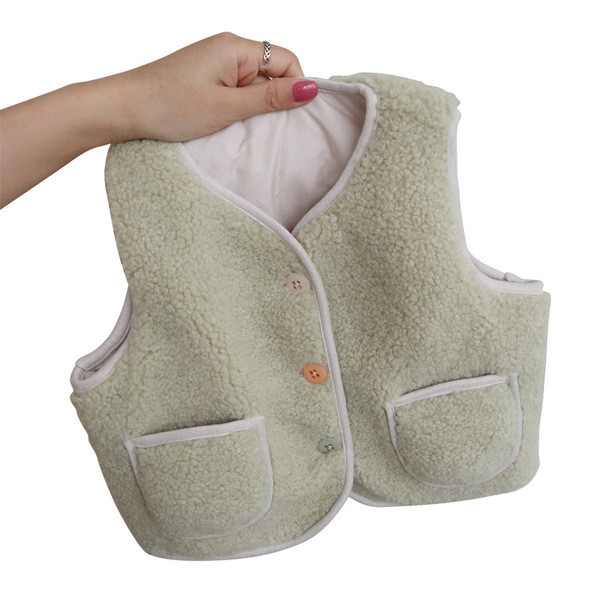 Lühike värviliste nööpide ja taskutega lastevest tüdrukutele