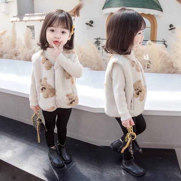 Nööpide ja spitsikaelusega igapäevane lastevest