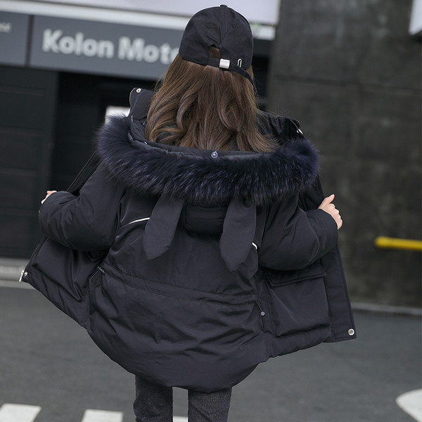 Kapuutsil ja taskul 3D elemendiga laste jope - tüdrukutele