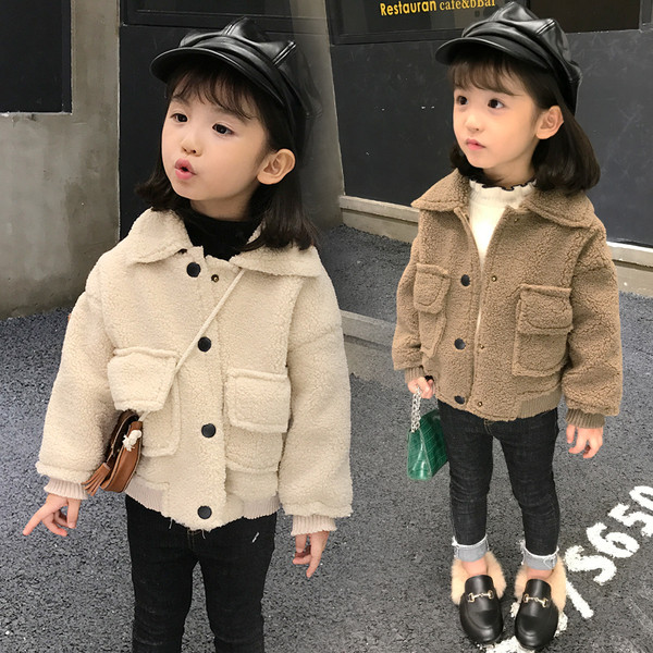 Taskute ja nööpidega laste sulejope tüdrukutele