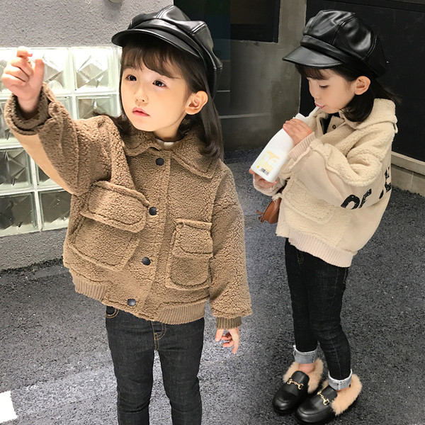 Taskute ja nööpidega laste sulejope tüdrukutele