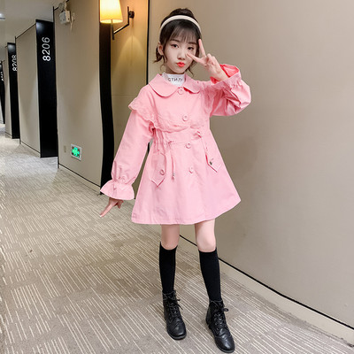 Moodne nööpide ja lokkidega lastemantel tüdrukutele