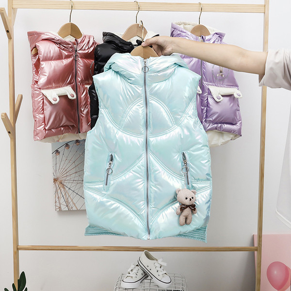 Kapuutsiga laste sügis-talvine vest