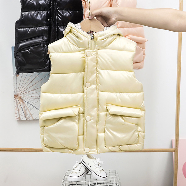 Laste sügis-talvine vest kapuutsiga ja taskutega