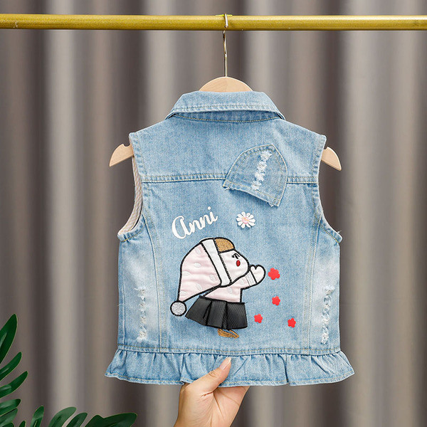 Moodne laste teksavest tüdrukutele, mille seljal on aplikatsioon