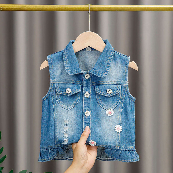 Moodne laste teksavest tüdrukutele, mille seljal on aplikatsioon