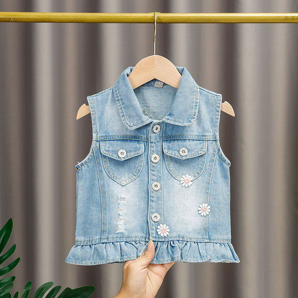 Moodne laste teksavest tüdrukutele, mille seljal on aplikatsioon