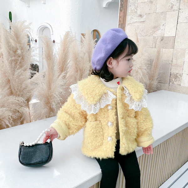 Tüdrukutele sobiv pitsi ja taskutega laste sulejope