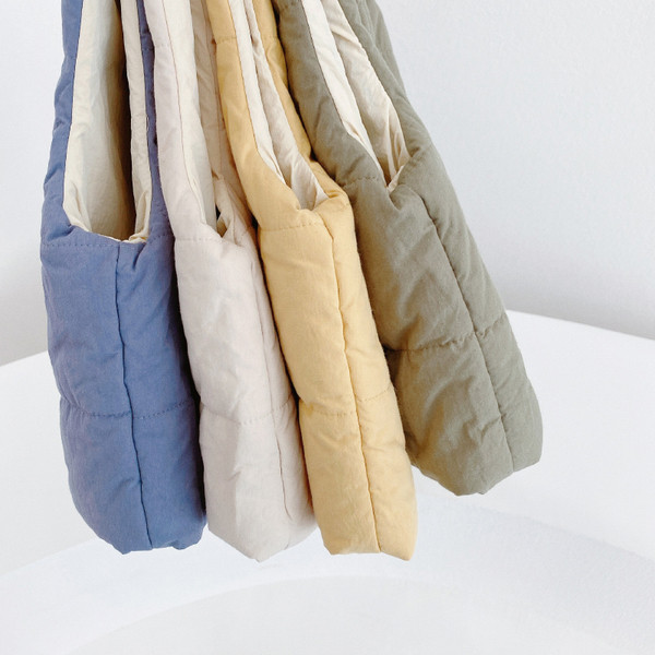 Ovaalse krae ja topeltkinnitusega igapäevane lastevest