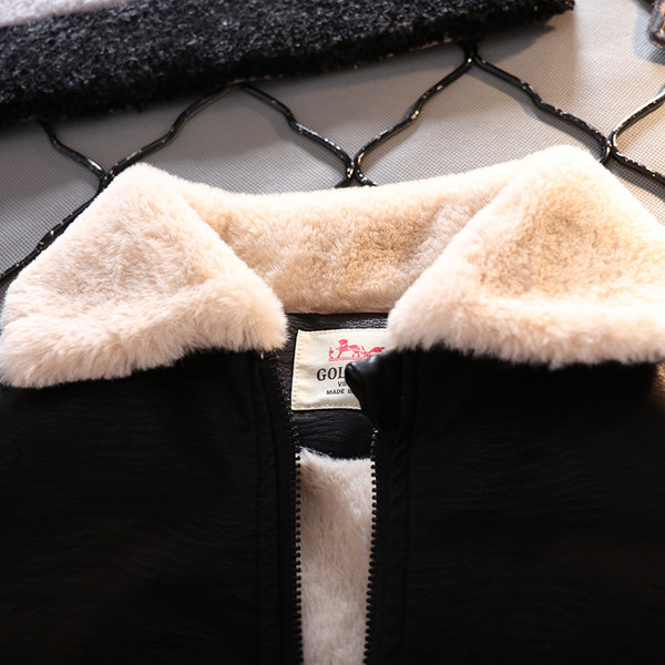 Vaikiška odinė striukė su siuvinėjimu - berniukams