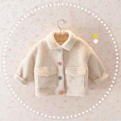 Värviliste nööpidega kohev lastejope