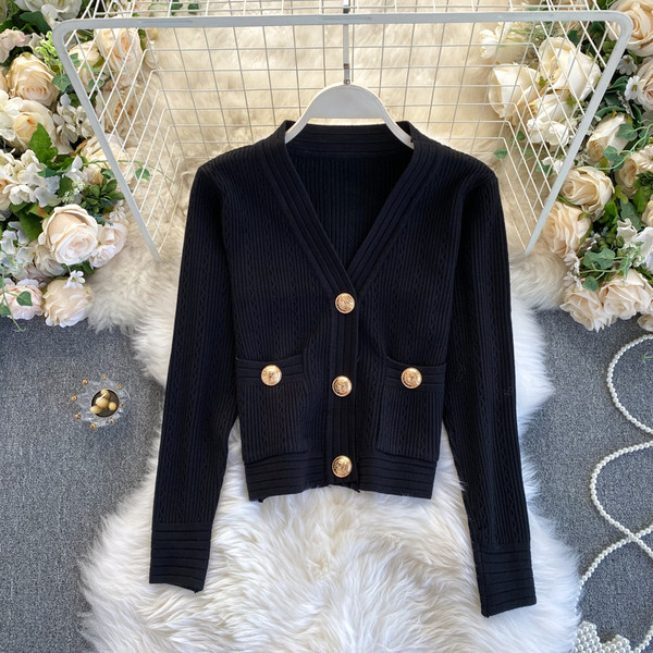 Naiste vest nööpide ja taskutega