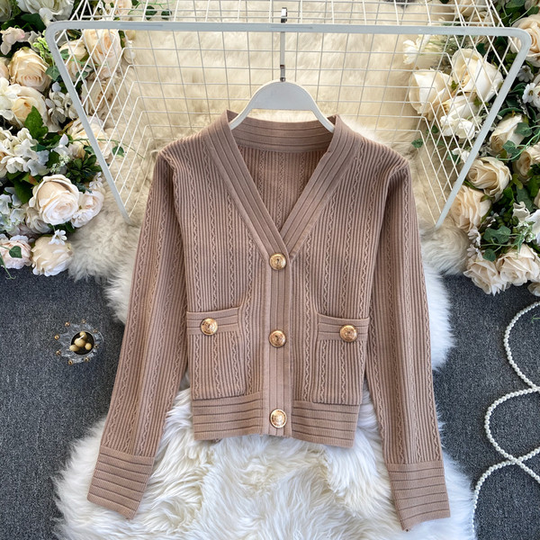 Naiste vest nööpide ja taskutega