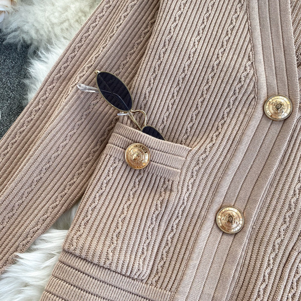 Naiste vest nööpide ja taskutega