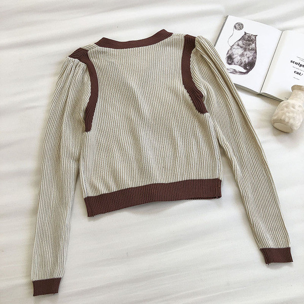 Ikdienas sieviešu veste ar V veida kakla izgriezumu