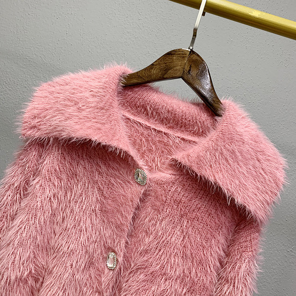 Ženska puhasta vesta na gumbe - kratki model