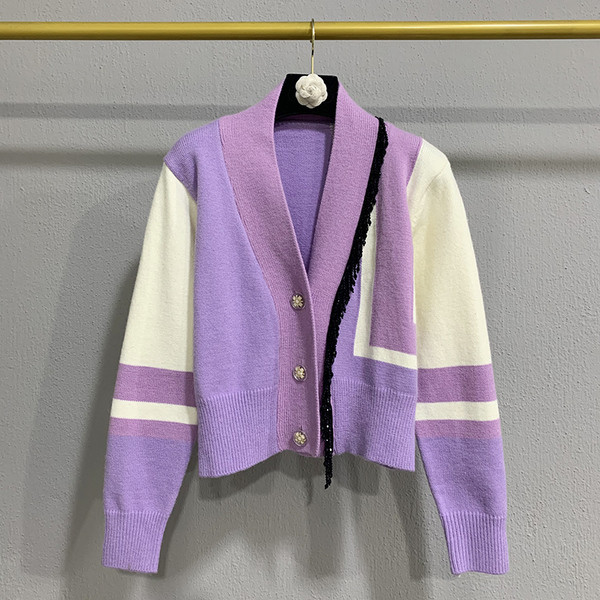 Vestă de damă colorată cu decolteu și nasturi spitz