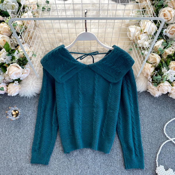 Naiste ümara dekoltee ja lipsudega kampsun