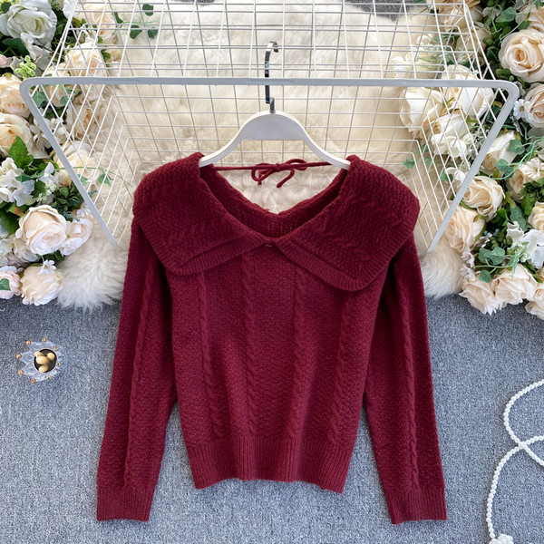 Naiste ümara dekoltee ja lipsudega kampsun