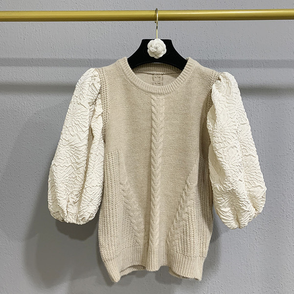 Γυναικείο πλεκτό πουλόβερ με στρογγυλή λαιμόκοψη και 7/8 μανίκια