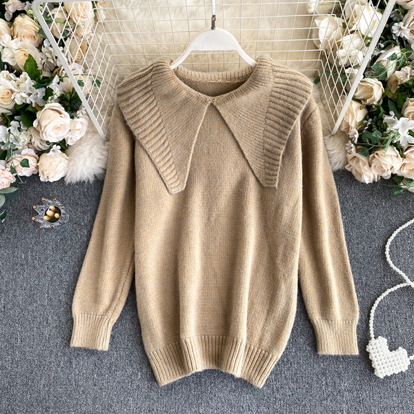 Pikk naiste kampsun ümara kaelusega ja pikkade varrukatega