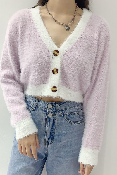 Naiste nööpidega sulevest - lühike mudel