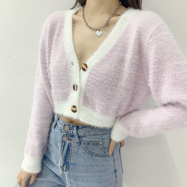 Naiste nööpidega sulevest - lühike mudel