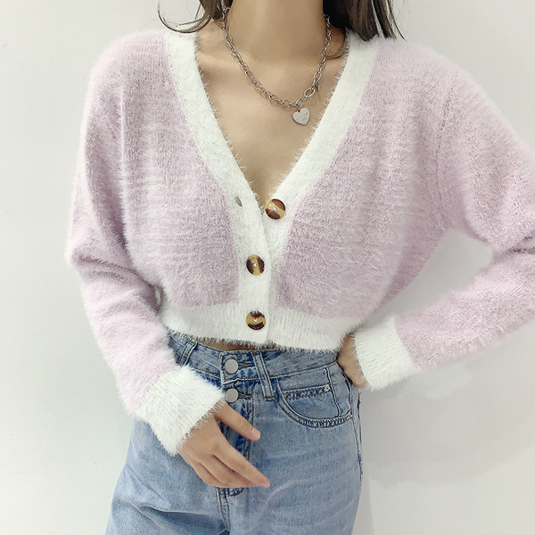 Naiste nööpidega sulevest - lühike mudel