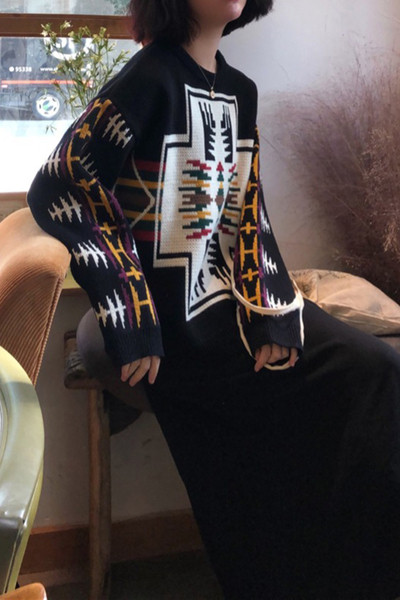 Γυναικείο φαρδύ πουλόβερ με οβάλ λαιμόκοψη