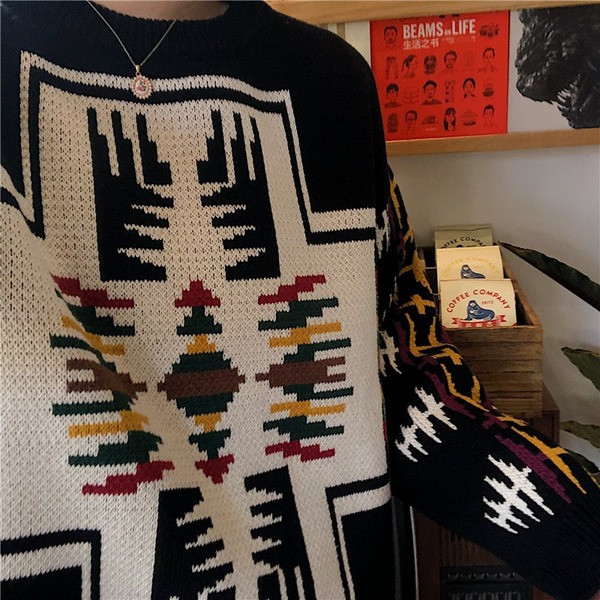 Γυναικείο φαρδύ πουλόβερ με οβάλ λαιμόκοψη