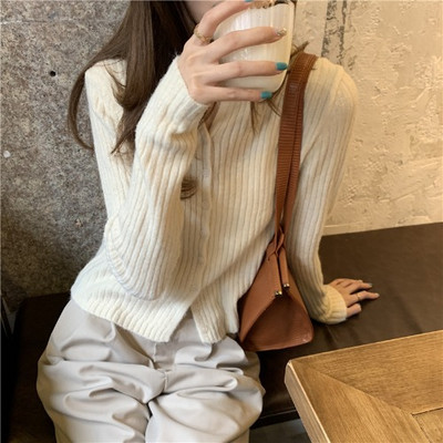 Κοντή γυναικεία ζακέτα με ντεκολτέ