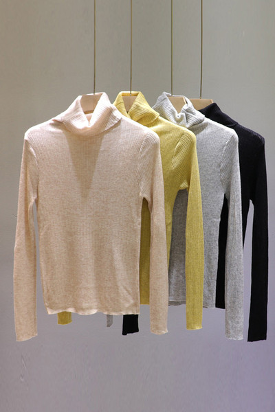 Γυναικεία πλεκτή μπλούζα με ψηλό γιακά