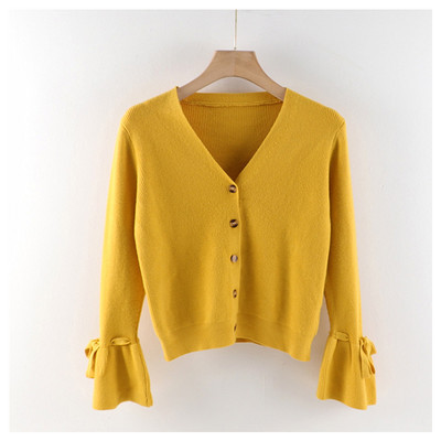 Moodne naiste vest spitsikaelusega ja lootosevarrukatega