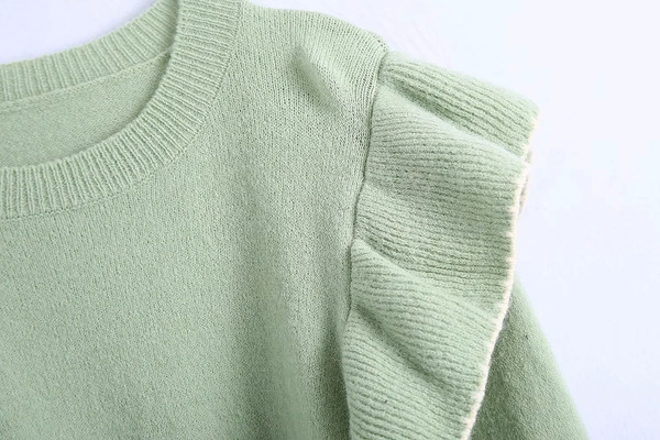 Õhukesest kudumisest lokkidega naiste kampsun