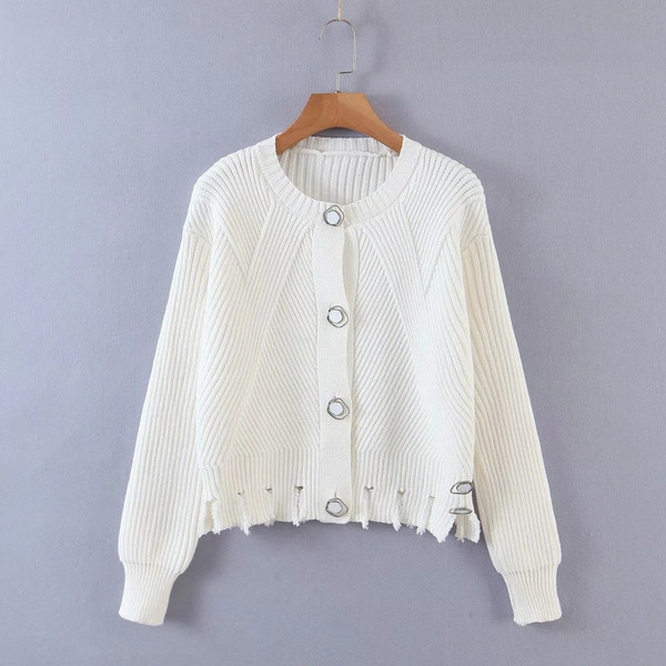 Moodne rebenenud motiivide ja nööpidega vest