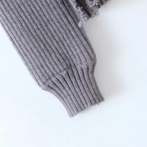 Moodne rebenenud motiivide ja nööpidega vest