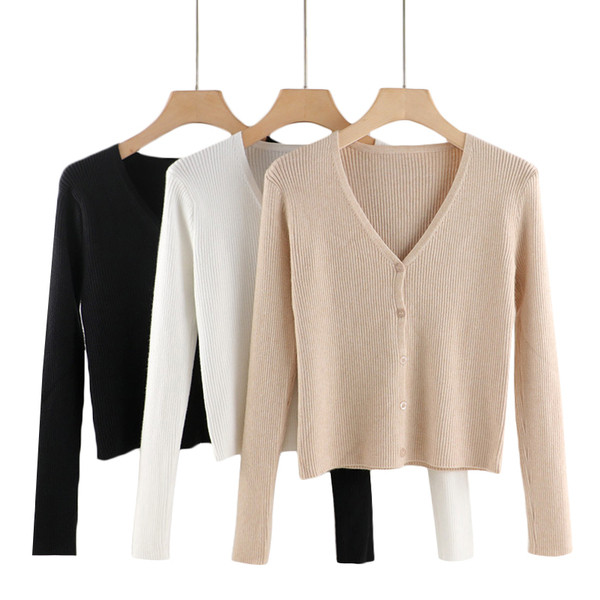 Ženski prsluk sa špic izrezom i gumbima