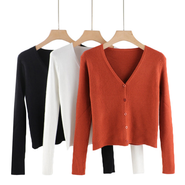 Ženski prsluk sa špic izrezom i gumbima