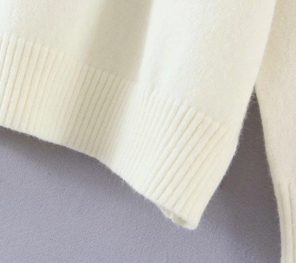 Laia mudelkampsun tikandiga