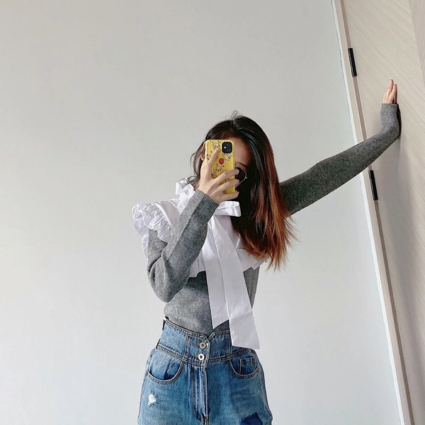 Γυναικείο πουλόβερ με μεγάλο γιακά και κορδέλα