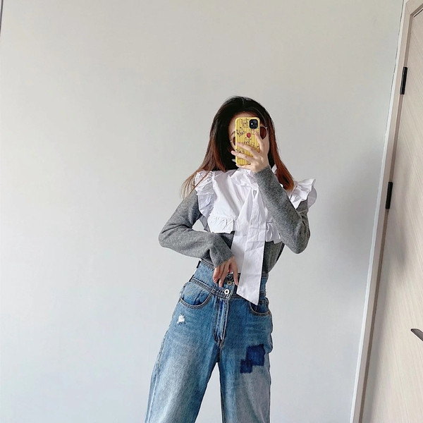 Γυναικείο πουλόβερ με μεγάλο γιακά και κορδέλα